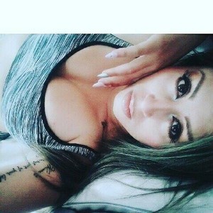 AboutSattine naked before webcam in live video chat