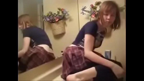 Amateur shy teen performs striptease and masturbates on cam