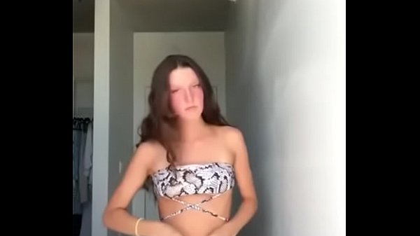 Shaved teen Doing a striptease