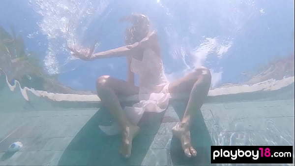 Big boobed naked Russian babe Katya Clover teasing under the water outdoor